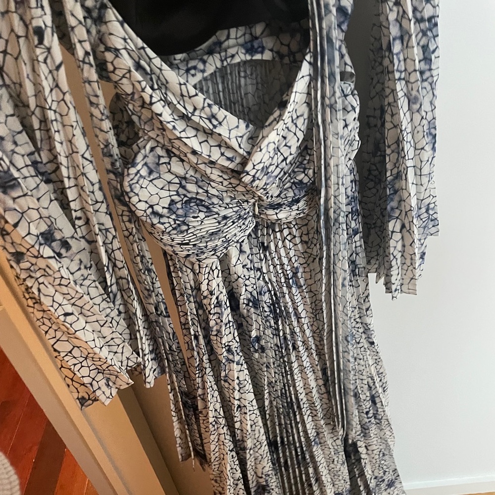 Alexis Blue long sleeve open back dress